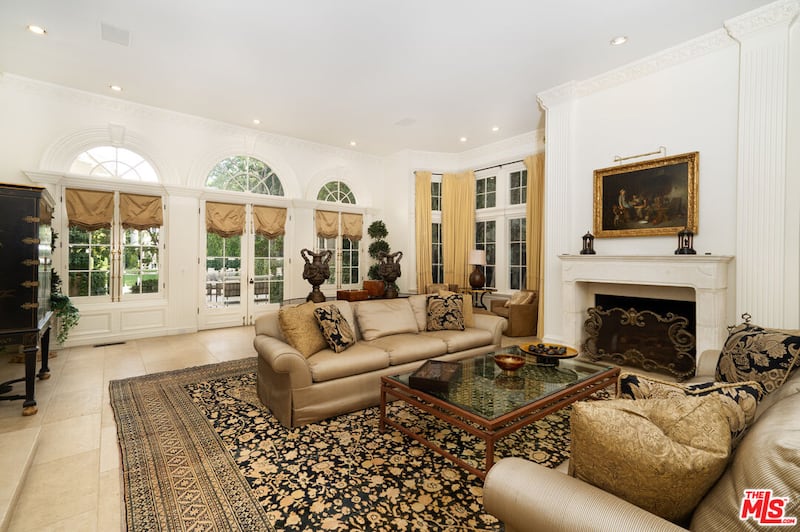 A living room space with built-in fireplace.