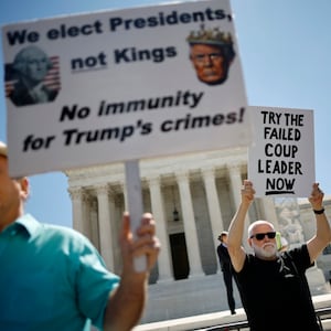 Demonstrators participate in a rally outside the U.S. Supreme Court after it's ruling in Trump v. United States