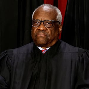 Clarence Thomas poses for a portrait inside the Supreme Court.