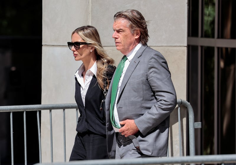 Melissa Cohen Biden and Kevin Morris walk outside the federal court on the day of Hunter Biden's trial on criminal gun charges, in Wilmington, Delaware, U.S., June 10, 2024. 