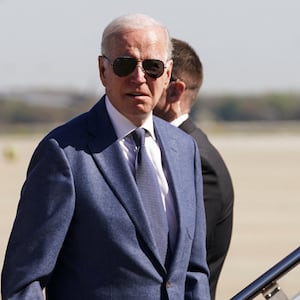 U.S. President Joe Biden is accompanied by his son, Hunter Biden, and his sister, Valerie Biden Owens, while boarding Air Force One