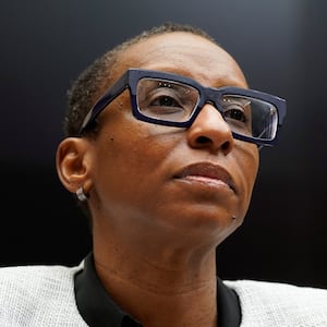 Harvard President Claudine Day stares forward during a Congressional hearing.