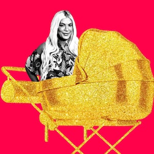 A photo of illustration of Tori Spelling in a baby carriage.