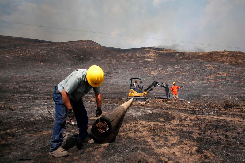 galleries/2013/08/18/wildfires-rage-in-idaho-photos/130818-idaho-fire-01_g2qevj