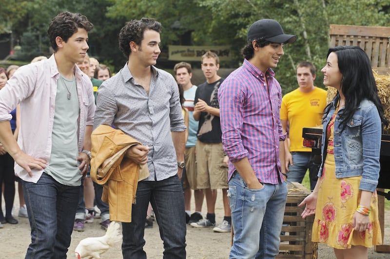 Nick Jonas, Kevin Jonas, Joe Jonas, and Demi Lovato in Camp Rock 2: The Final Jam