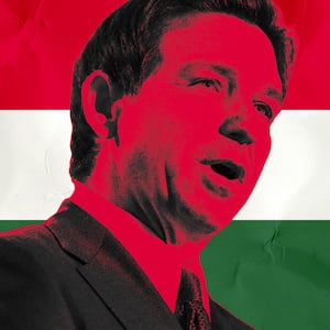 A photo illustration of Florida Governor Ron DeSantis over the flag of Hungary.