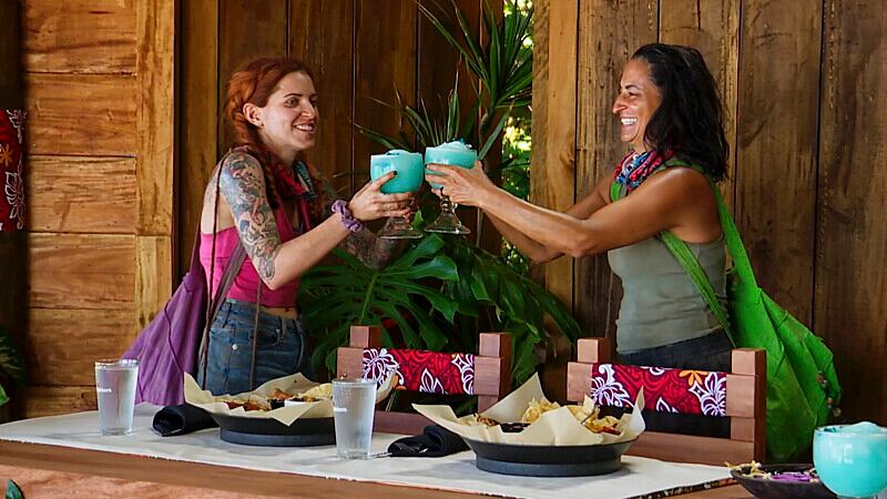 Kenzie and Maria drinking Applebee's margaritas.