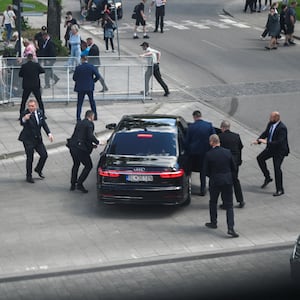 Security officers move Slovakia Prime Minister Robert Fico in a car after a shooting incident, after a Slovak government meeting in Handlova, Slovakia, May 15, 2024. 