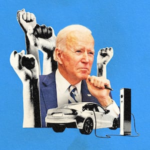 Joe Biden surrounded by raised fists and an electric car