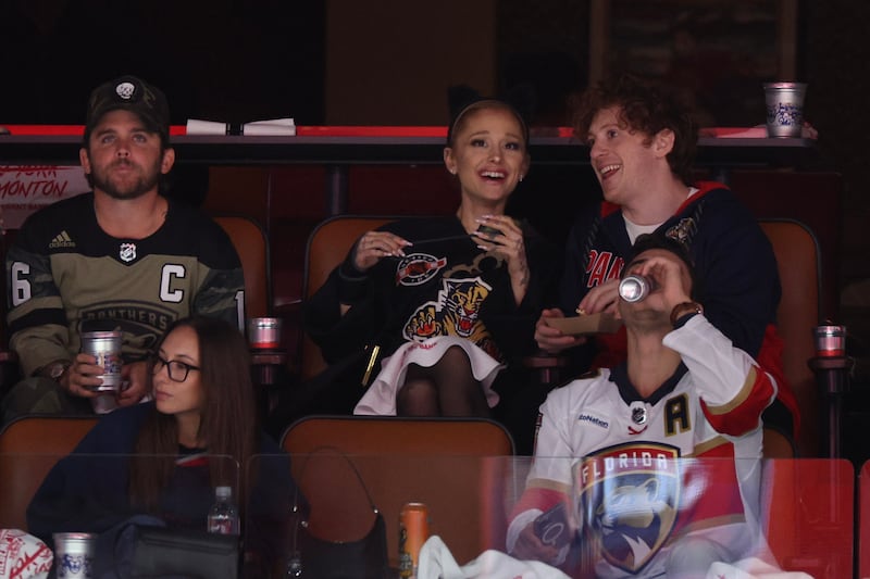 Ariana Grande and Ethan Slater look on prior to Game One of the 2024 Stanley Cup Final between the Florida Panthers and the Edmonton Oilers at Amerant Bank Arena on June 08, 2024 in Sunrise, Florida.