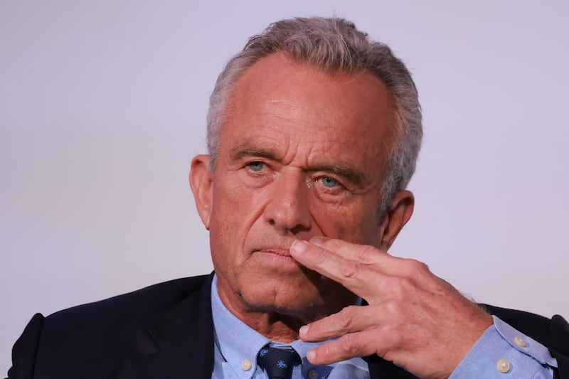 Democratic Presidential candidate Robert F. Kennedy Jr. listens while Rabbi Shmuley Boteach speaks during The World Values Network's Presidential Candidate Series that discusses fighting antisemitism and championing Israel, in New York City