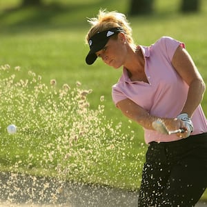 Stephanie Sparks from the Golf Channel plays a bunker shot on the seventh hole during the second round of the Ginn Open at Reunion Resort on April 18, 2008 in Reunion, Florida.