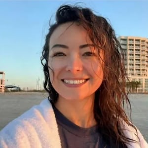 Mica Miller smiles in a selfie taken at the beach.