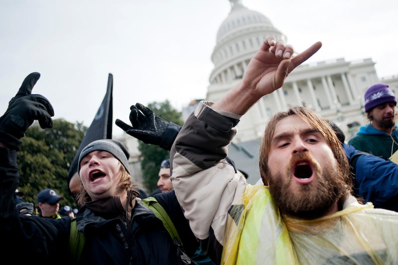 articles/2012/01/18/occupy-wall-street-takes-aim-at-congress/occupy-dc-cheat_nwujv7