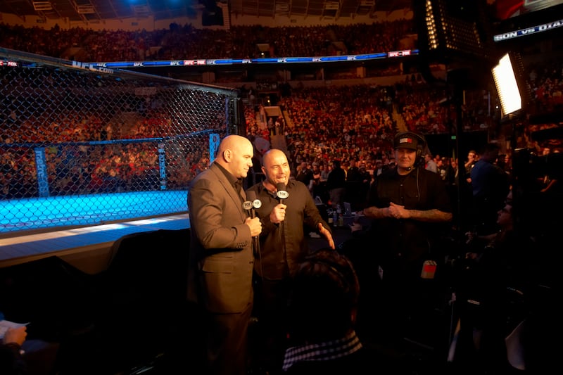 Mixed Martial Arts: UFC on Fox: UFC president Dana White (L) and announcer Joe Rogan before a fight at KeyArena at Seattle Center. 
Seattle, WA 12/8/2012
CREDIT: Jed Jacobsohn (Photo by Jed Jacobsohn /Sports Illustrated via Getty Images)
(Set Number: X155892 TK2 R1 F135 )