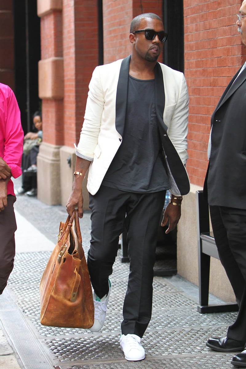 galleries/2011/10/13/lil-wayne-kanye-west-jude-law-man-purses-called-murses-photos/man-murses-purses-gal-kanye_zhascs