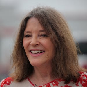 Marianne Williamson waits for the start of the Fourth of July Parade in Merrimack, New Hampshire