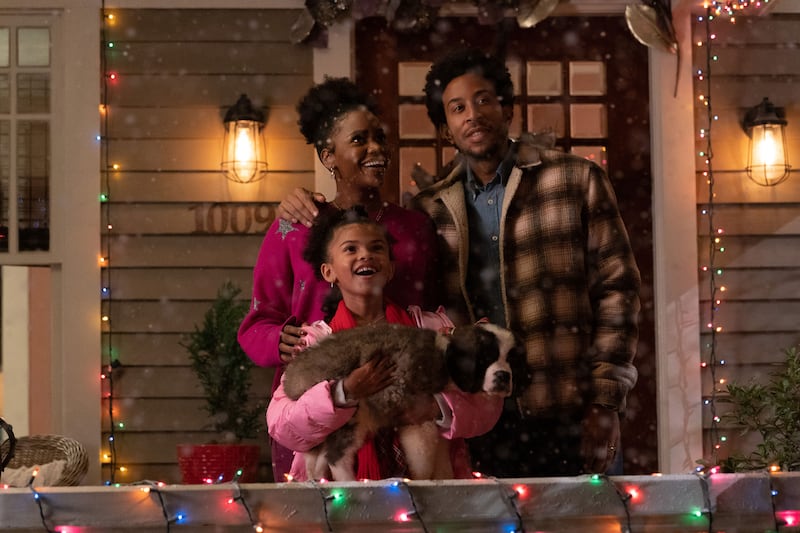 Teyonah Parris as Allison, Madison Skye Validum as Charlotte, and Chris 'Ludacris' Bridges as Eddie in DASHING THROUGH THE SNOW