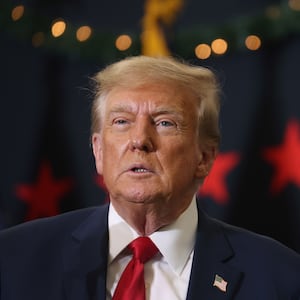 Republican presidential candidate and former U.S. President Donald Trump looks on .