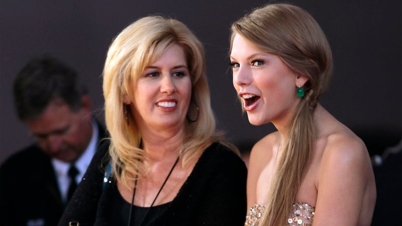 Taylor Swift talks with her publicist Paula Erickson.