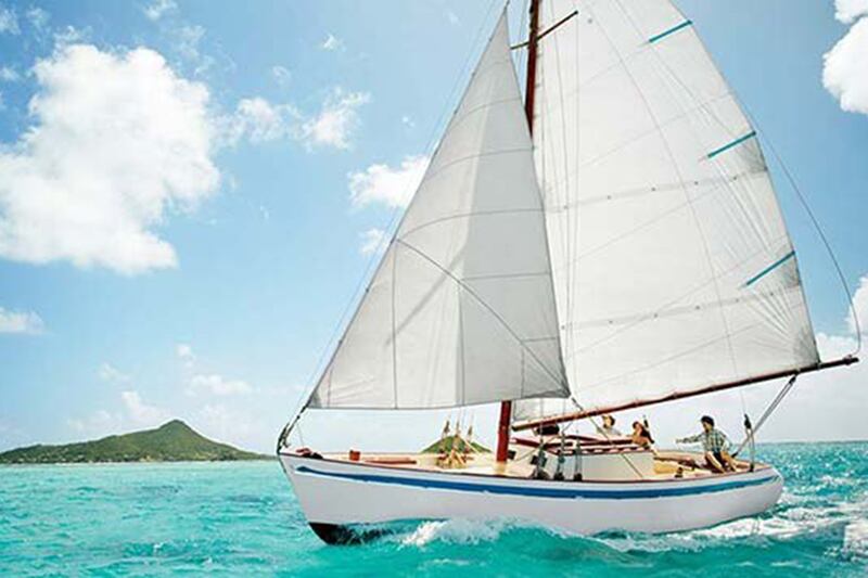 articles/2013/09/05/my-island-vacation-exploring-the-blissfully-quirky-grenadines/130905-moon-grenadines-charter-sailboat_l9gwpb