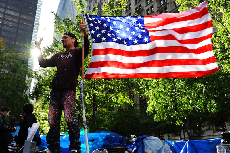 articles/2011/11/05/tree-of-life-and-survivor-tree-at-occupy-wall-street-a-history/two-trees-daly-tease_wekeie