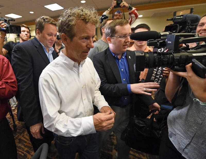 Sergio Gor accompanies his former boss, Sen. Rand Paul (R-KY) through a group of supporters in Las Vegas in 2015.