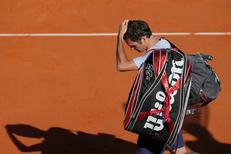 galleries/2013/06/09/roger-federer-a-history-in-hair-days-photos/130607-federer-hair-days-01-tease_fzwe6i