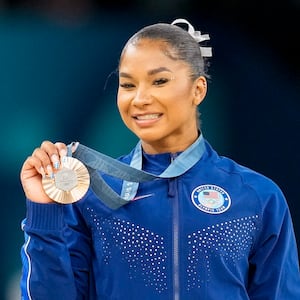 Jordan Chiles holding her bronze medal during the Olympic Games in Paris. 