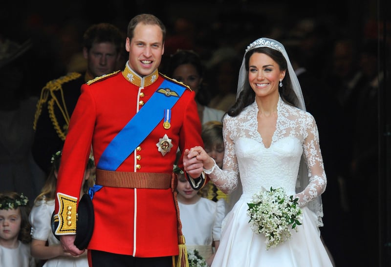 Prince William, left, and Catherine, Duchess of Cambridge, are seen walking after their wedding ceremony in Westminster Abbey in central London in this April 29, 2011 file photograph.