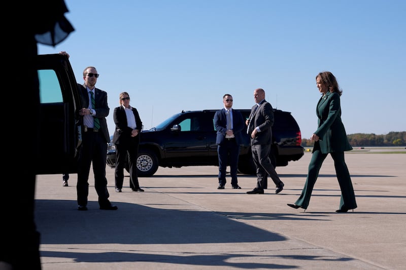 Democratic presidential nominee Kamala Harris arrives at an airport in Waterford Township, Michigan on October 21, 2024.