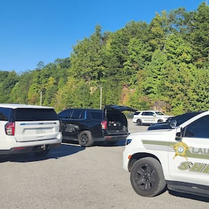 An image of Laurel County Sheriff's Office vehicles following a highway shooting in Kentucky.