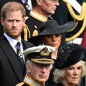 Britain's Meghan, Duchess of Sussex, reacts as she, Prince Harry, Duke of Sussex, Queen Camilla and King Charles attend the state funeral and burial of Britain's Queen Elizabeth, in London, Britain, September 19, 2022.