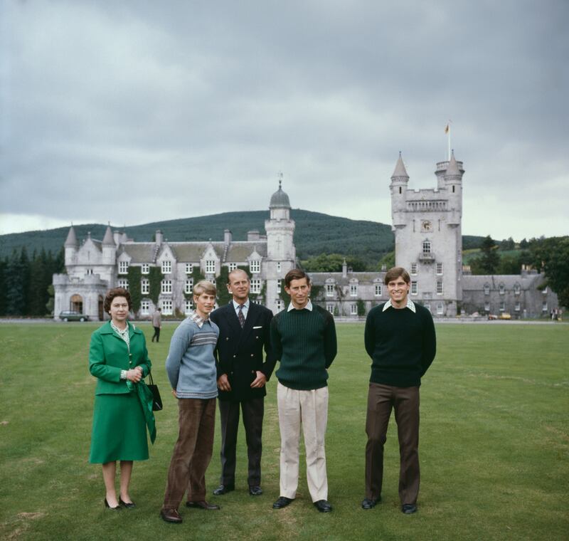 Queen Elizabeth II with Prince Philip, the Duke of Edinburgh and their sons Prince Edward (second from left), Prince Charles (second from right) and Prince Andrew (right) in the grounds of Balmoral Castle in Scotland, UK, 20th September 1979.