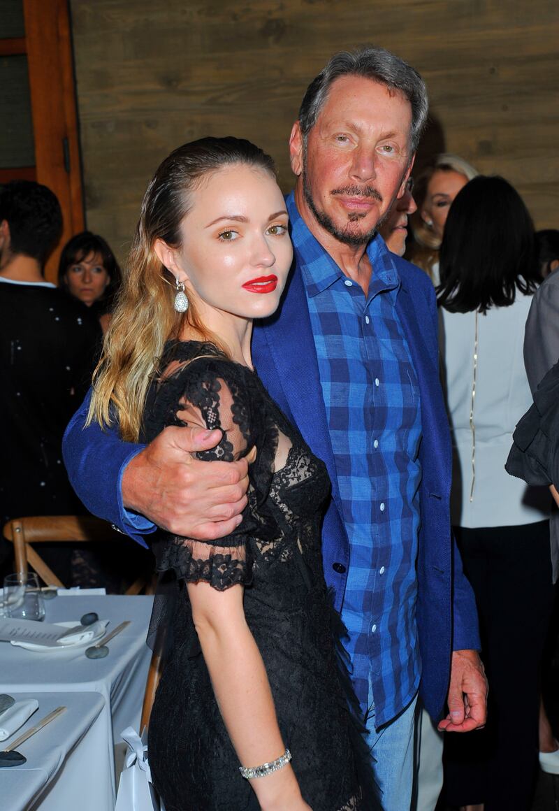 Blogger Nikita Kahn and Larry Ellison attend an event in Malibu, California.  