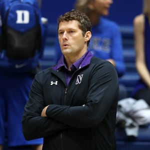 Northwestern University volleyball coach Shane Davis has been accused of hazing by a female player.