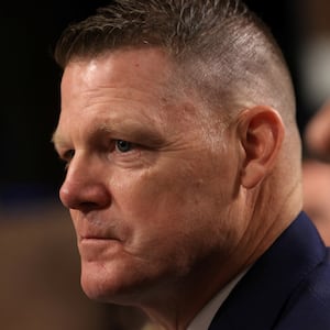 Ronald Rowe Jr. stares forward during a congressional hearing.