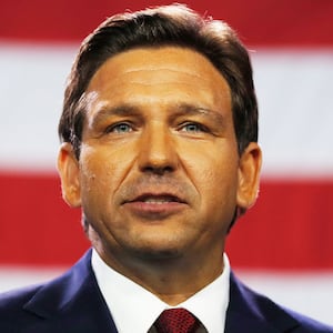 A photo including Florida Gov. Ron DeSantis