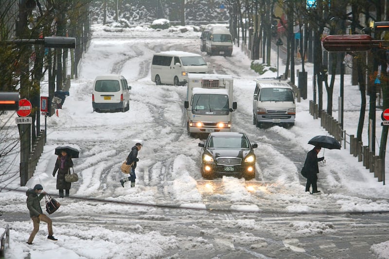 galleries/2014/02/18/snowstorm-cripples-japan-photos/140218-japan-snowstorm-4_n2k5qj