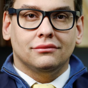 Rep. George Santos (R-NY) poses for a portrait at his desk in the Longworth House Office Building on Capitol Hill in Washington, D.C., Feb. 28, 2023.