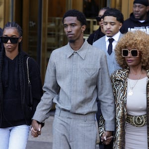 D’Lila Star Combs, King Combs and Janice Combs exit court Thursday.