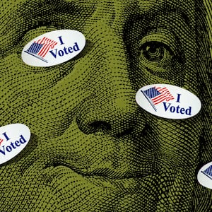 Photo illustration of Ben Franklin from the $100 bill with "I Voted" stickers scattered