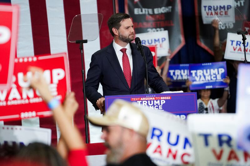 J.D. Vance speaks on stage during a campaign event