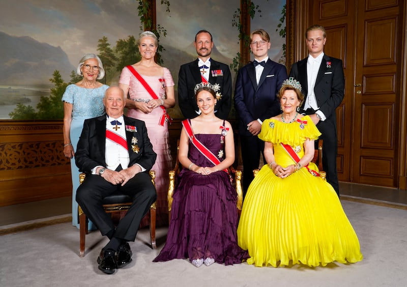 Norway's Princess Ingrid Alexandra (front C) poses for a family photo with (front L and R) Norway's King Harald V and Norway's Queen Sonja and (back LtoR) Marit Tjessem, Norway's Crown Princess Mette-Marit, Norway's Crown Prince Haakon, Norway's Prince Sverre Magnus and Marius Borg Hoiby on the occasion of a gala dinner for her 18th birthday in Oslo on June 17, 2022.