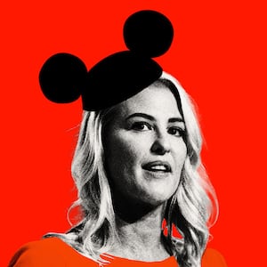 Photo illustration of Bridget Ziegler wearing a Mickey Mouse hat on a red background.