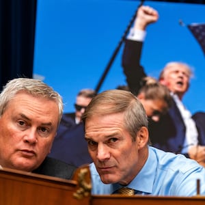 Rep. James Comer (R-KY) and Rep. Jim Jordan (R-OH) chat with each other as United States Secret Service Director Kimberly Cheatle testifies before the House Oversight and Accountability Committee.