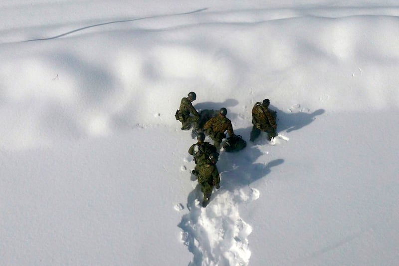 galleries/2014/02/18/snowstorm-cripples-japan-photos/140218-japan-snowstorm-6_dfn3xp