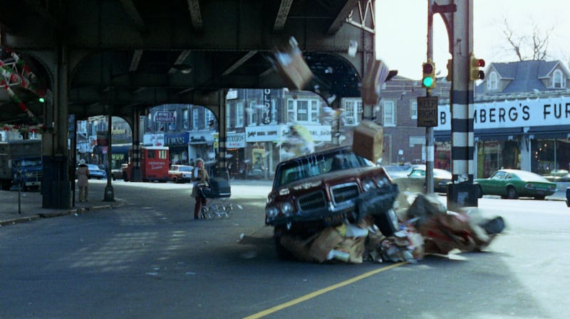 A still of the car chase where Gene Hackman dodges a woman with a baby carriage from The French Connection.