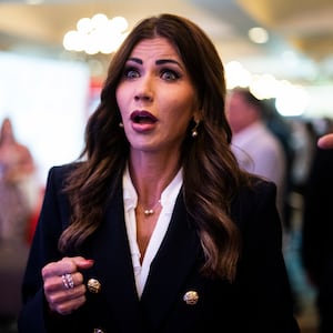 South Dakota Gov. Kristi Noem, walks to an interview during the second day of the Conservative Political Action Conference CPAC on Friday, Feb. 25, 2022 in Orlando, FL. 