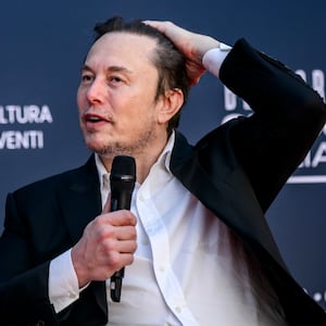 Elon Musk speaks at a conference in Italy.